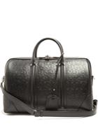 Givenchy Logo And Star-debossed Leather Holdall