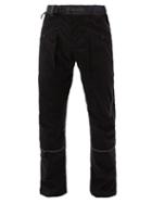 Matchesfashion.com And Wander - Logo-print Shell Trousers - Mens - Black