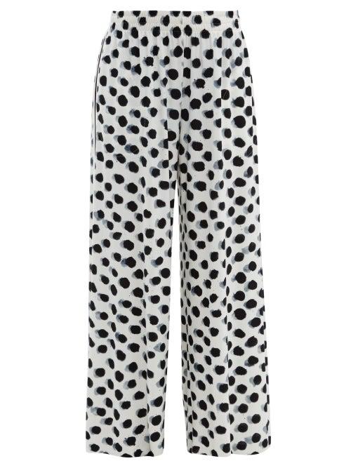 Matchesfashion.com Norma Kamali - Polka Dot Print Side Striped Jersey Trousers - Womens - White Black