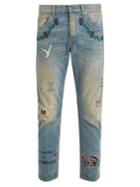 Gucci Mid-rise Embroidered Tapered-leg Jeans
