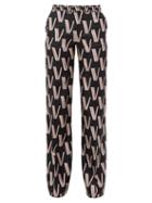 Matchesfashion.com Valentino - High-rise V-print Silk-satin Trousers - Womens - Black