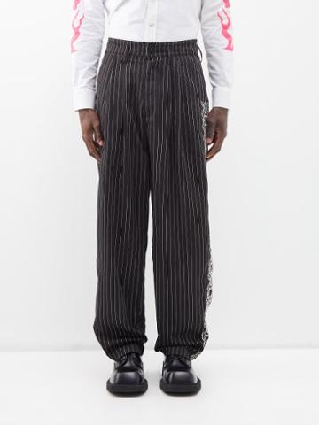 Youths In Balaclava - Pinstripe Pleated Cotton-twill Trousers - Mens - Black