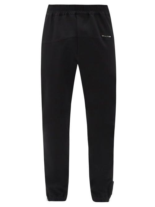 Matchesfashion.com 1017 Alyx 9sm - Logo-plaque Zip-cuff Track Pants - Mens - Black