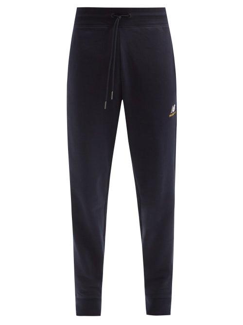 Mens Activewear New Balance - Logo-embroidered Cotton-jersey Track Pants - Mens - Navy