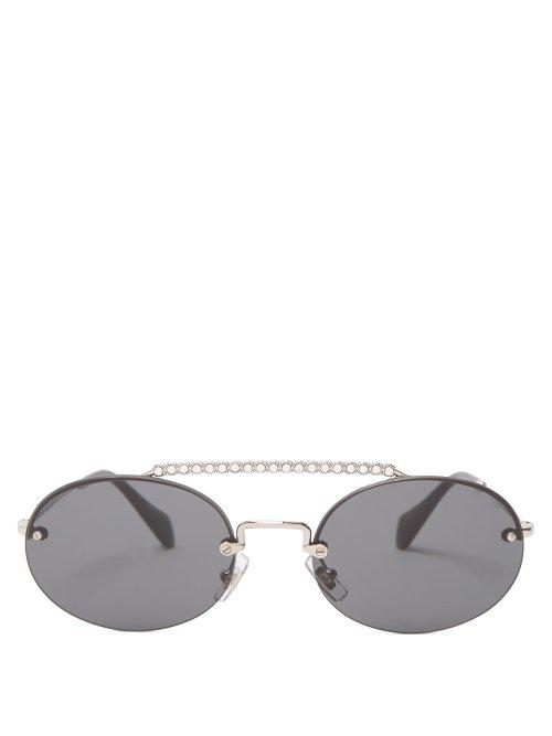 Matchesfashion.com Miu Miu - Oval Shaped Rimless Sunglasses - Womens - Black