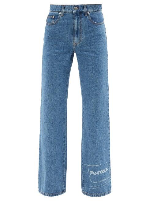Jw Anderson - Logo-stamped Denim Bootcut Jeans - Womens - Mid Denim