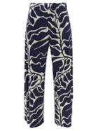 Pleats Please Issey Miyake - Leaf-print Technical-pleated Wide-leg Trousers - Womens - Blue Print