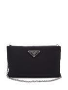 Matchesfashion.com Prada - Logo Plaque Small Padded Nylon Clutch - Womens - Black