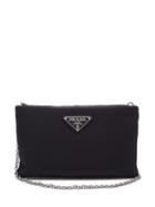 Matchesfashion.com Prada - Logo Plaque Small Padded Nylon Clutch - Womens - Black