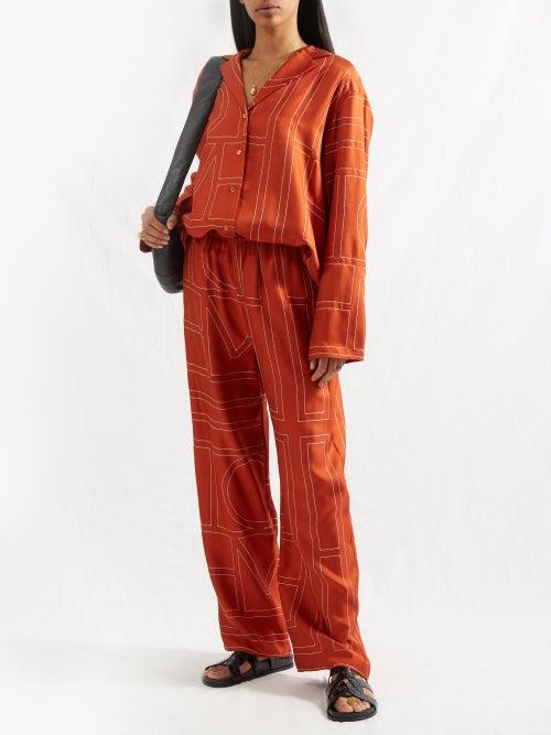 Toteme - Logo-embroidered Twill Trousers - Womens - Dark Orange