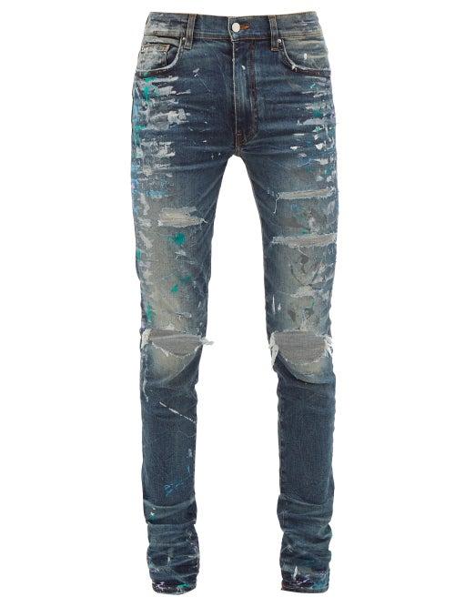 Matchesfashion.com Amiri - Paint Splatter Distressed Slim Leg Jeans - Mens - Indigo