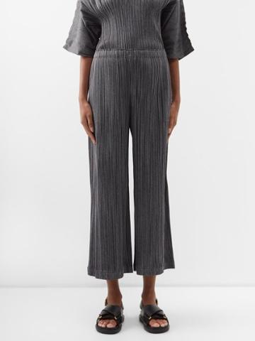 Pleats Please Issey Miyake - Cropped Technical-pleated Trousers - Womens - Black White
