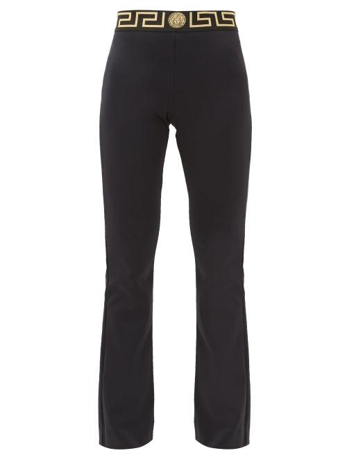 Matchesfashion.com Versace - Logo-intarsia Tech-jersey Flared Leggings - Womens - Black