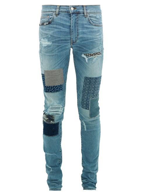 Matchesfashion.com Amiri - Distressed Patchwork Slim Leg Jeans - Mens - Light Blue