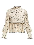 Matchesfashion.com Ganni - Lowell Polka Dot Pliss Blouse - Womens - Ivory