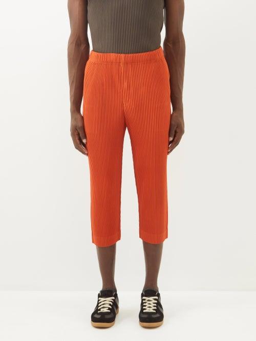 Homme Pliss Issey Miyake - Cropped Technical-pleated Slim-leg Trousers - Mens - Orange
