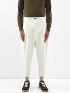 Ami - Pleated Cotton Carrot-leg Trousers - Mens - Cream