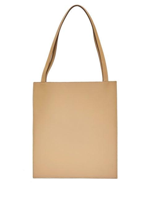 Matchesfashion.com The Row - Flat Logo-debossed Leather Tote Bag - Womens - Tan