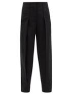 Loewe - Carrot Asymmetric Pleated Wool Trousers - Womens - Black