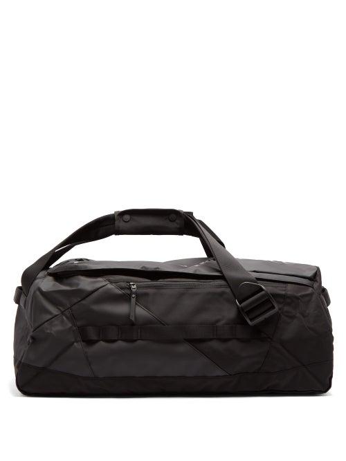 Matchesfashion.com Peak Performance - Vertical Logo Print Shell Duffle Bag - Mens - Black