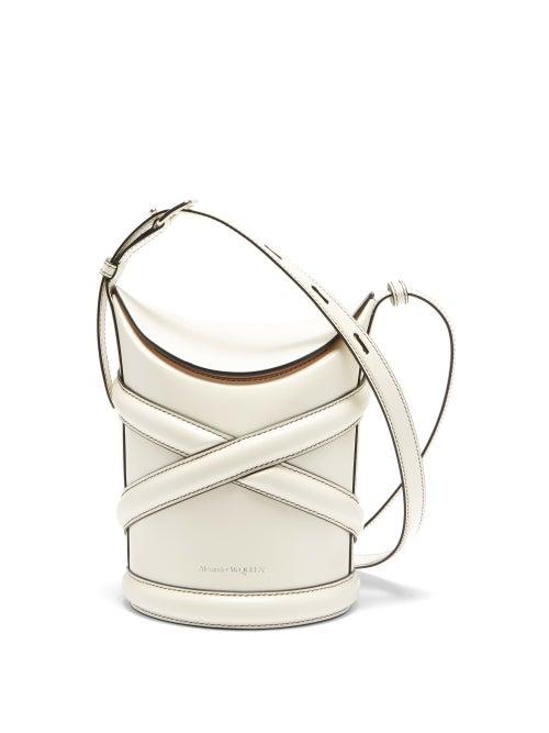 Matchesfashion.com Alexander Mcqueen - The Curve Small Harness-strap Leather Bucket Bag - Womens - Ivory