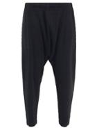 Mens Rtw Homme Pliss Issey Miyake - Dropped-crotch Technical-pleated Jersey Trousers - Mens - Black