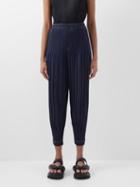 Pleats Please Issey Miyake - Ramie Denim Technical-pleated Trousers - Womens - Indigo