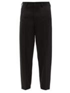 Lemaire - Pleated Wool Tapered-leg Trousers - Mens - Black