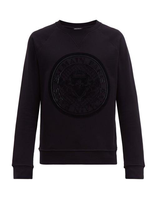 Matchesfashion.com Balmain - Flocked Laser Cut Coat Of Arms Cotton Sweatshirt - Mens - Black