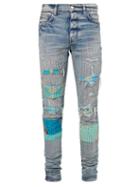 Amiri - Art Patch Topstitched Distressed Skinny Jeans - Mens - Blue