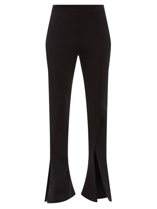 Matchesfashion.com A.w.a.k.e. Mode - Slit-cuff Crepe Flared-leg Trousers - Womens - Black