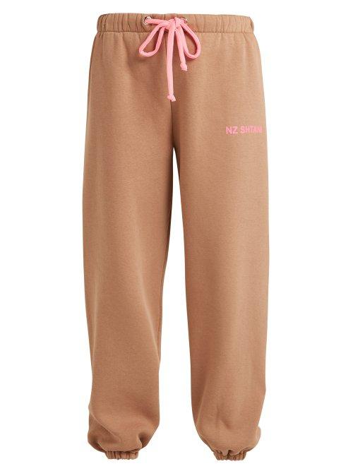 Matchesfashion.com Natasha Zinko - Logo Print Track Pants - Womens - Beige