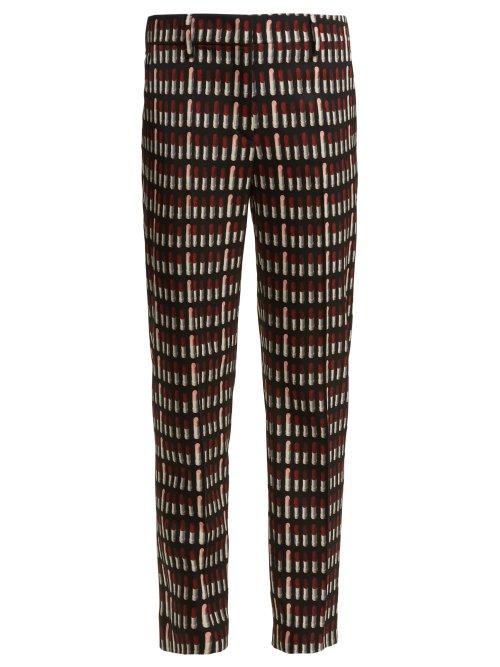 Matchesfashion.com Prada - Lipstick Print Wool Blend Trousers - Womens - Black Print