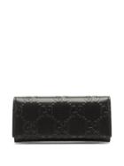 Matchesfashion.com Gucci - Gg-logo Embossed-leather Wallet - Mens - Black