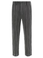 Homme Pliss Issey Miyake - Leon Striped Technical-pleated Suit Trousers - Mens - Black