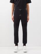 Balmain - Logo-print Organic Cotton-jersey Track Pants - Mens - Black Silver