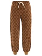 Matchesfashion.com Gucci - Gg-print Technical-jersey Track Pants - Womens - Brown Multi
