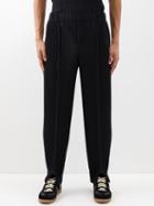 Homme Pliss Issey Miyake - Technical-pleated Knit Trousers - Mens - Black