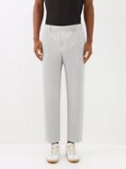 Homme Pliss Issey Miyake - Technical-knit Trousers - Mens - Light Grey