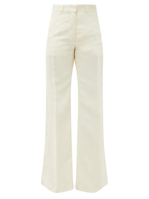 Matchesfashion.com Victoria Beckham - High-rise Canvas Flared Trousers - Womens - Ivory