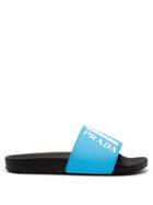 Matchesfashion.com Prada - Logo Embossed Rubber Slides - Mens - Light Blue