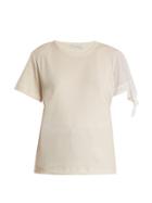 Matchesfashion.com Jw Anderson - Contrast Sleeve Ribbed Jersey T Shirt - Womens - Cream