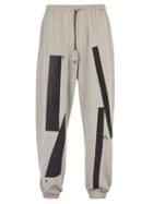 Matchesfashion.com A-cold-wall* - Plastisol Printed Cotton Jersey Track Pants - Mens - Beige