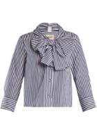 Khaite Natalie Striped Bow-embellished Cotton Blouse