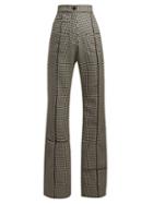 Matchesfashion.com Loewe - Flared Houndstooth Wool Trousers - Womens - Black White