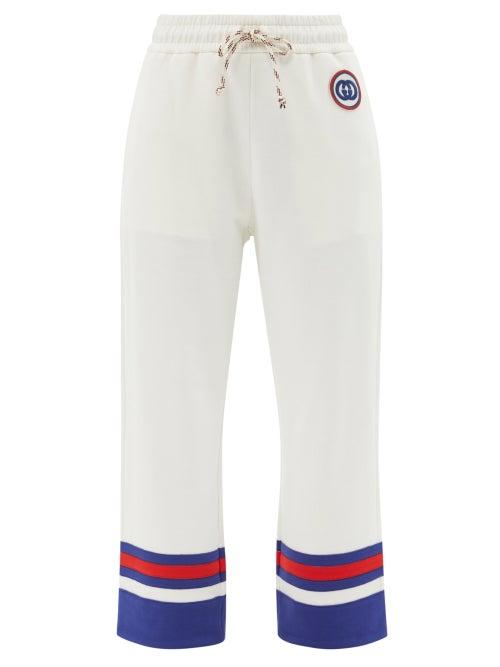 Gucci - Gg-embroidered Cropped Cotton-jersey Track Pants - Womens - White Multi
