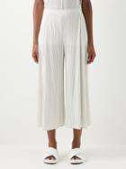 Pleats Please Issey Miyake - Technical-pleated Wide-leg Trousers - Womens - Ivory