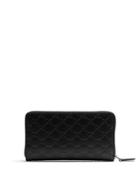 Gucci Gg-debossed Leather Travel Wallet