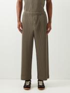 Homme Pliss Issey Miyake - Technical-pleated Wide-leg Trousers - Mens - Green