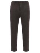 Homme Pliss Issey Miyake - Technical-pleated Tapered-leg Trousers - Mens - Dark Grey